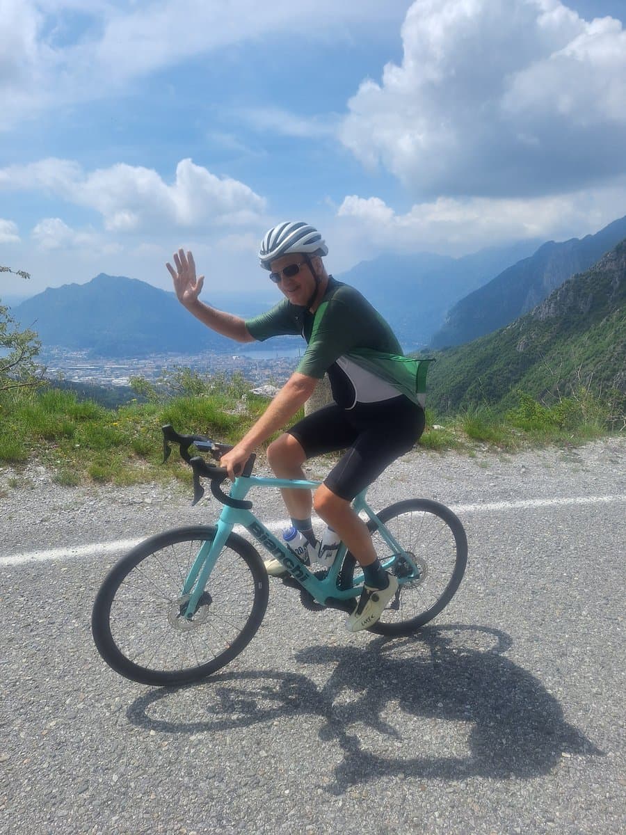 Cyclist on a scenic road in Lake Como