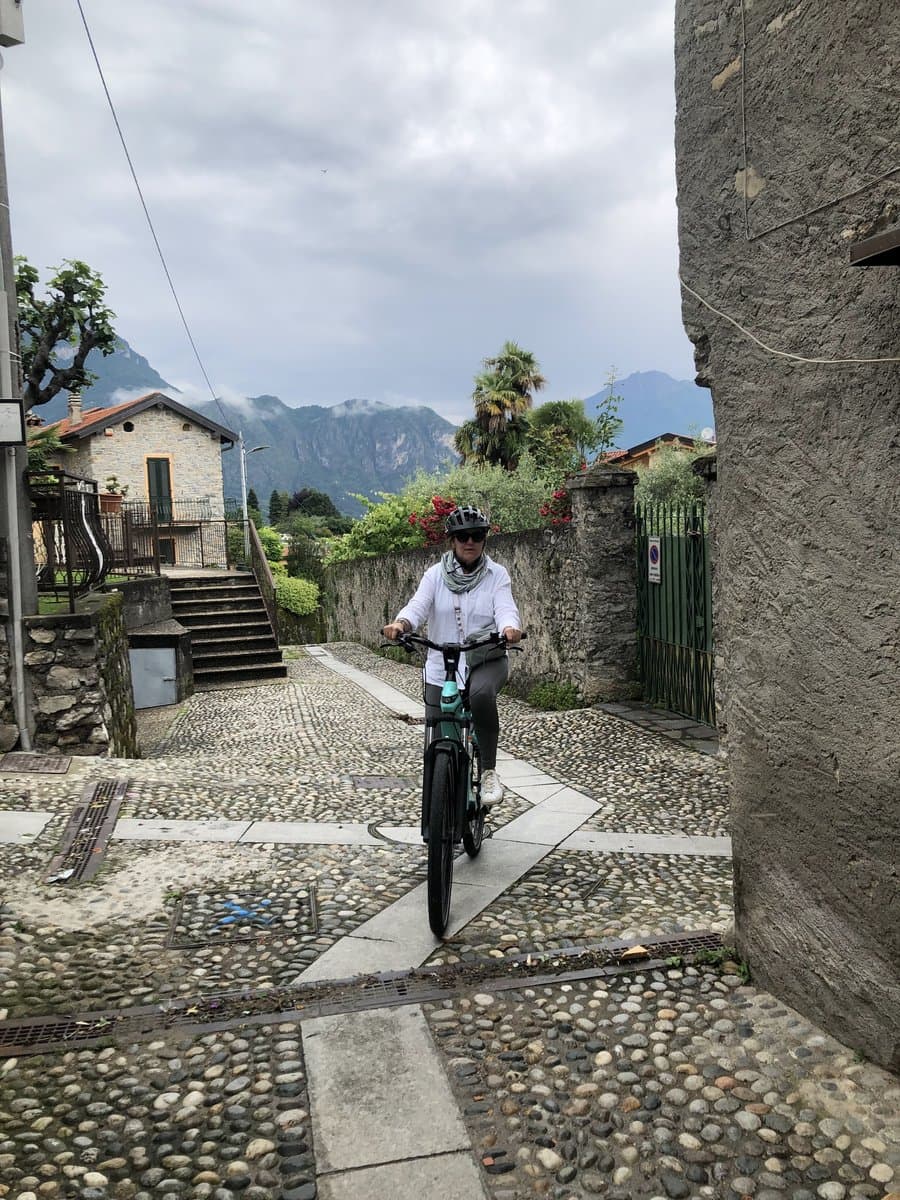 Cyclist in a Cobblestone Street