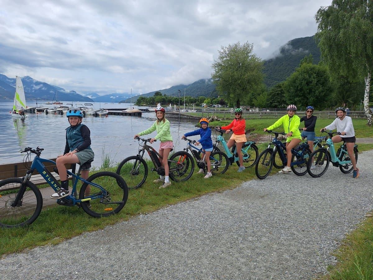 Group of Cyclists by Lake Como Group of Cyclists by Lake Como