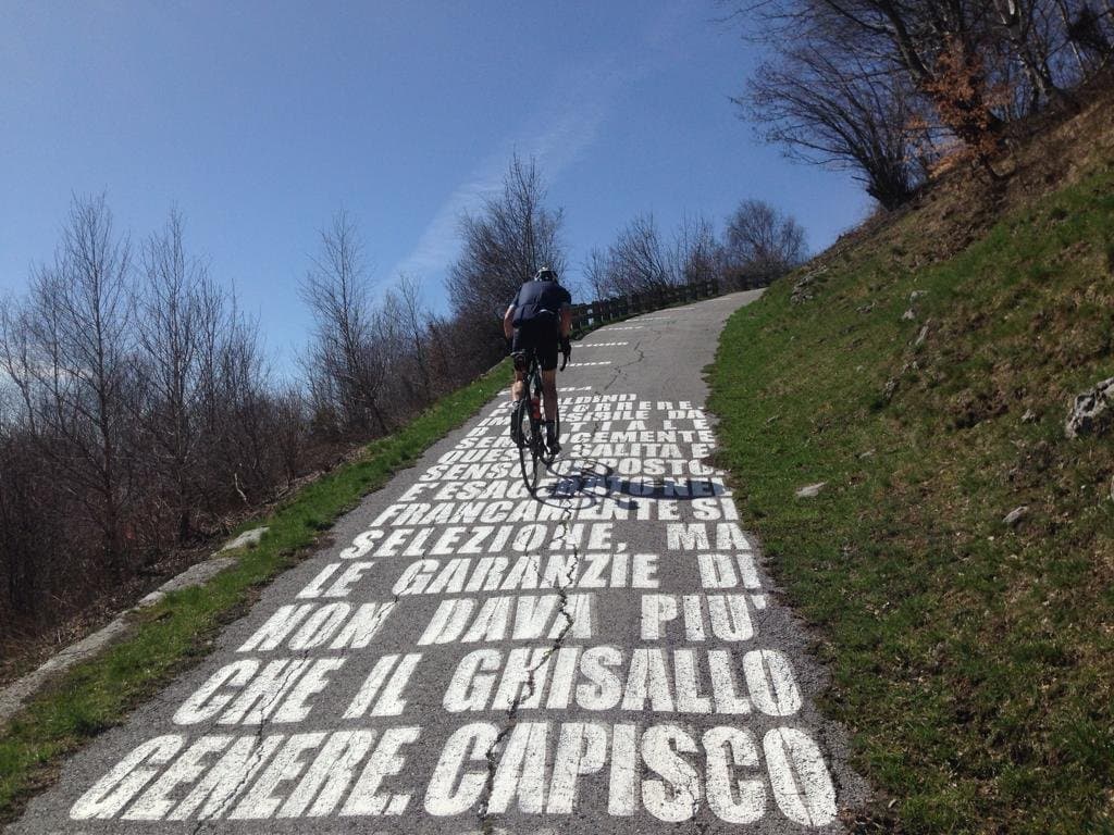 Cyclist on a Scenic Mountain Road Cyclist on a Scenic Mountain Road
